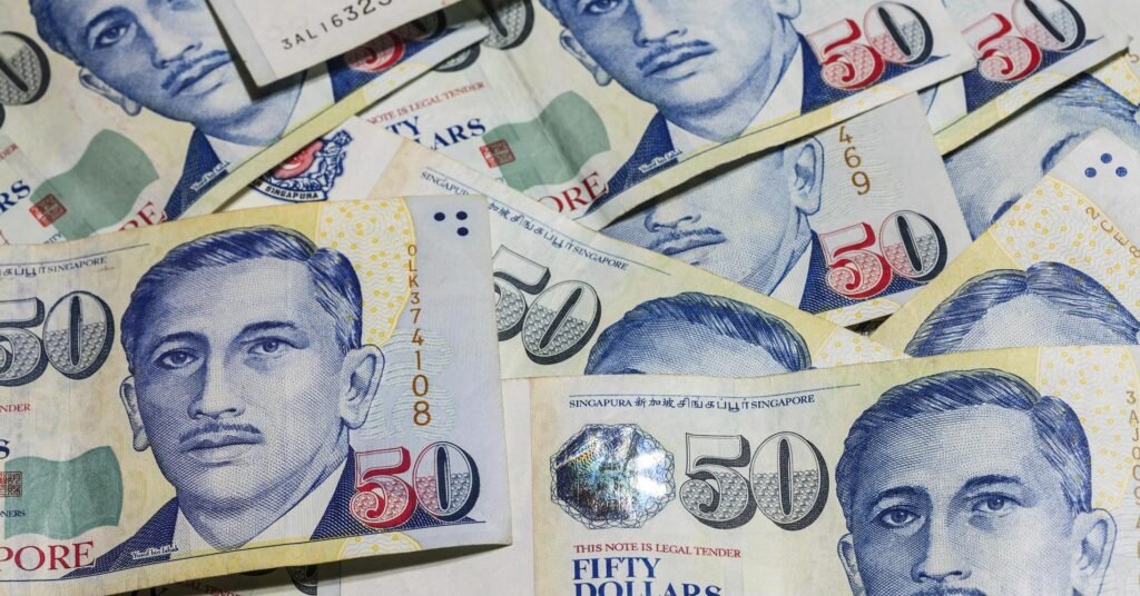 USD/SGD falls to 118-month low on bets of out-sized Fed cut