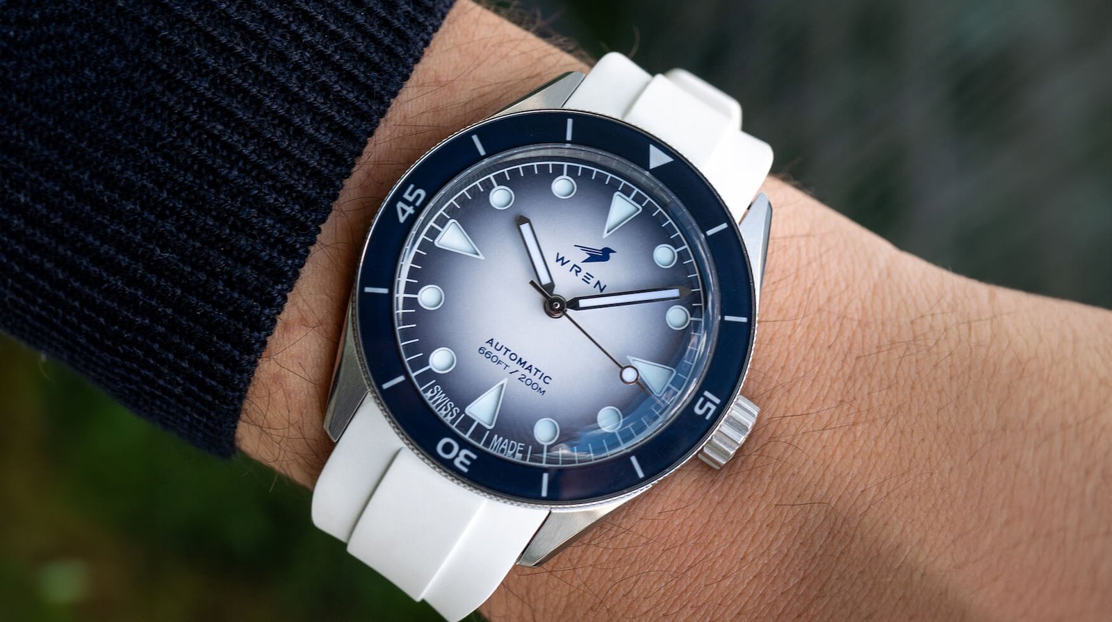 The Wren Diver One Snow is sub-$1k, with a sandwich dial, Sellita movement, and both a strap and bracelet