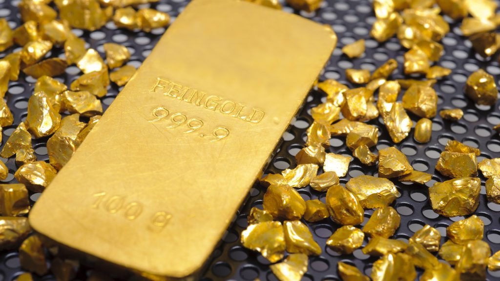 Gold trades near record levels on rising geopolitical risks